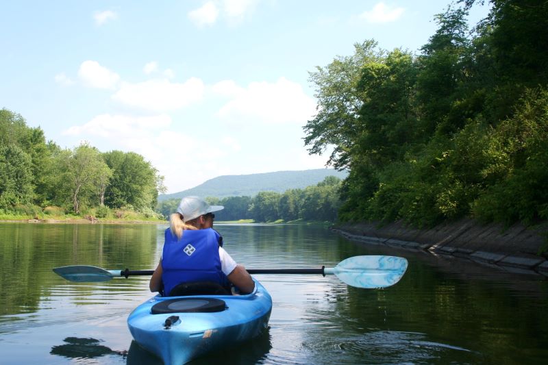 A woman in a kayak on the Susquehanna River
