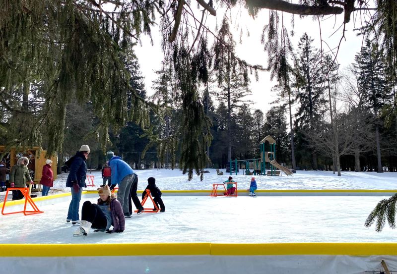 Children and parents skate at the Laporte ice rink