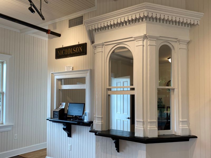 Ticket window with ornate woodworking
