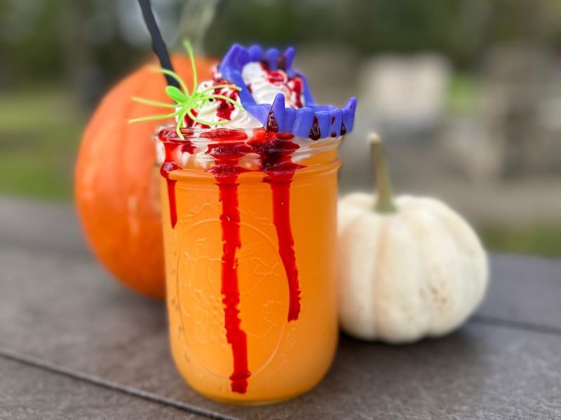 An orange, vampire-themed wine slushy from Grovedale Winery