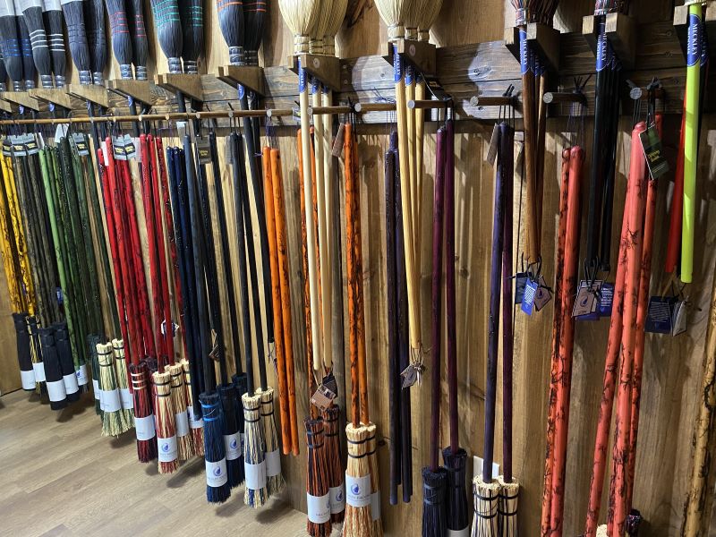 Wall of colorful witch brooms