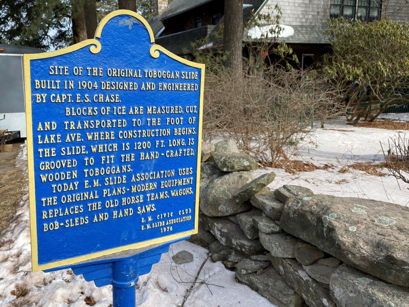 A historical marker stands at the junction of Lake Avenue and Route 42.